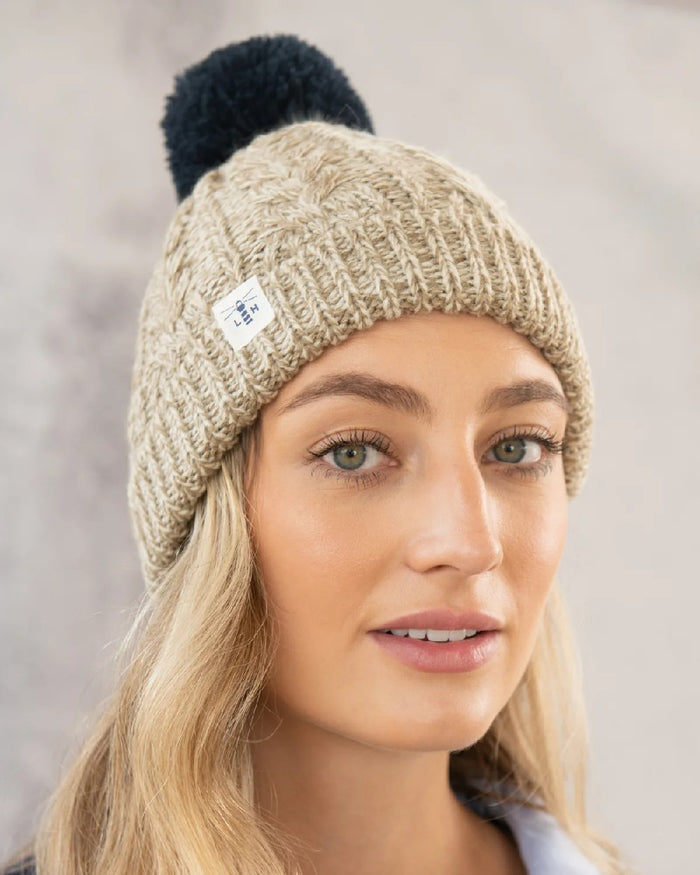 Lighthouse Hannah Bobble Hat in Almond/Navy #colour_almond-navy
