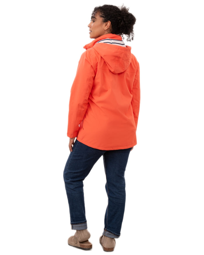 Coral coloured Lighthouse Ladies Beachcomber II Coat on white background #colour_coral