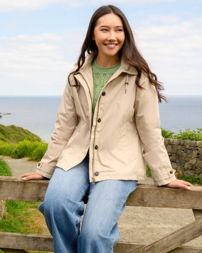 Clay coloured Lighthouse Ladies Blair Coat on outdoor background #colour_clay