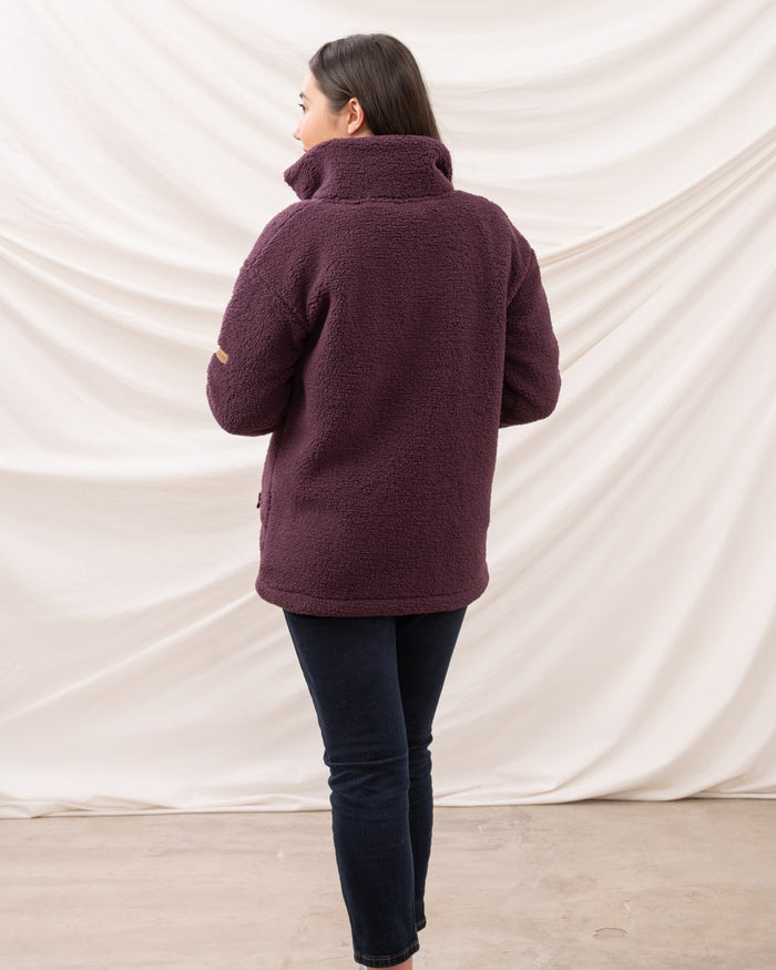 Cranberry coloured Lighthouse Ladies Cobh Full Zip Fleece Jacket on curtain background #colour_cranberry