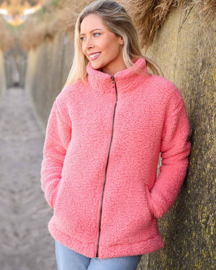 Sugar Coral coloured Lighthouse Ladies Seashell Full Zip Sherpa Fleece on street background #colour_sugar-coral