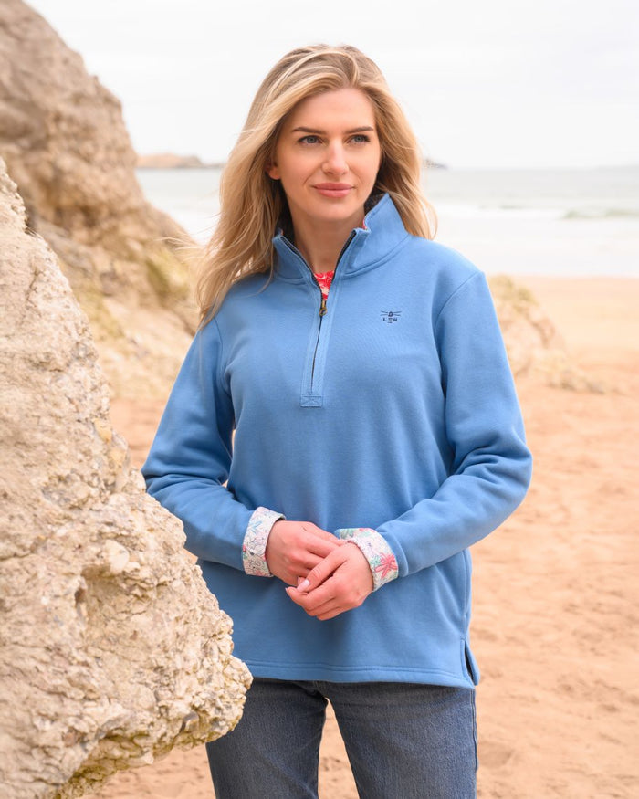 Marine Blue coloured Lighthouse Ladies Shore Sweatshirt on beach background #colour_marine-blue