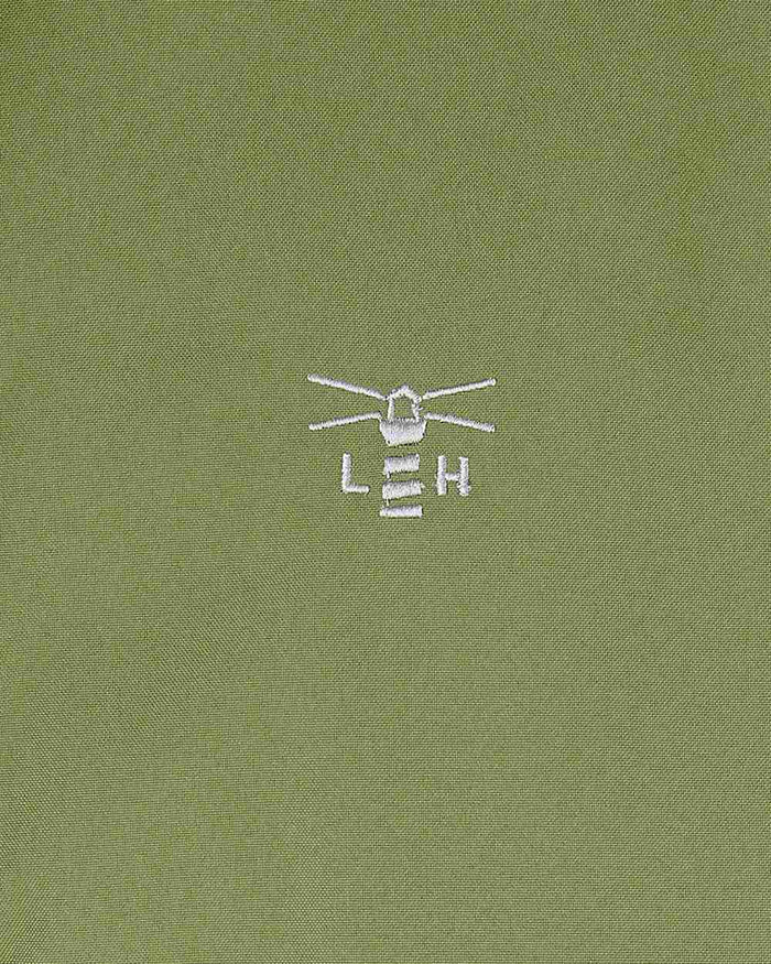 Sea Kelp coloured Lighthouse Ladies Tess Coat on white background #colour_sea-kelp