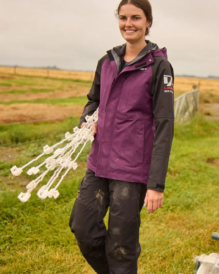 Blackberry Black Colour Line 7 Womens Territory Storm Pro20 Waterproof Jacket on farm background #colour_blackberry-black
