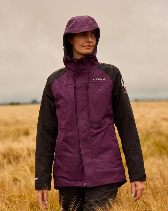Blackberry Black Colour Line 7 Womens Territory Storm Pro20 Waterproof Jacket on farm background #colour_blackberry-black