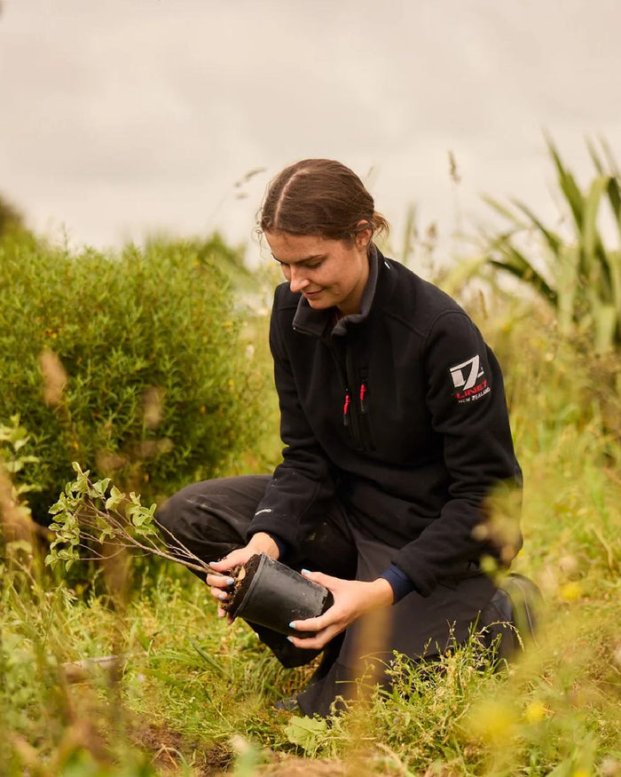 Black Coloured Line 7 Womens Territory Wind Pro Half Zip Fleece Jacket on forest background #colour_black