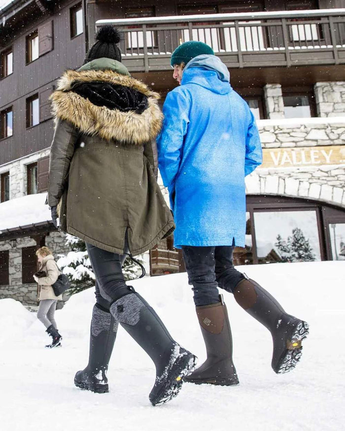 Black Grey Geometric coloured Muck Boots Womens Arctic Ice Tall Wellingtons on snow background #colour_black-grey-geometric