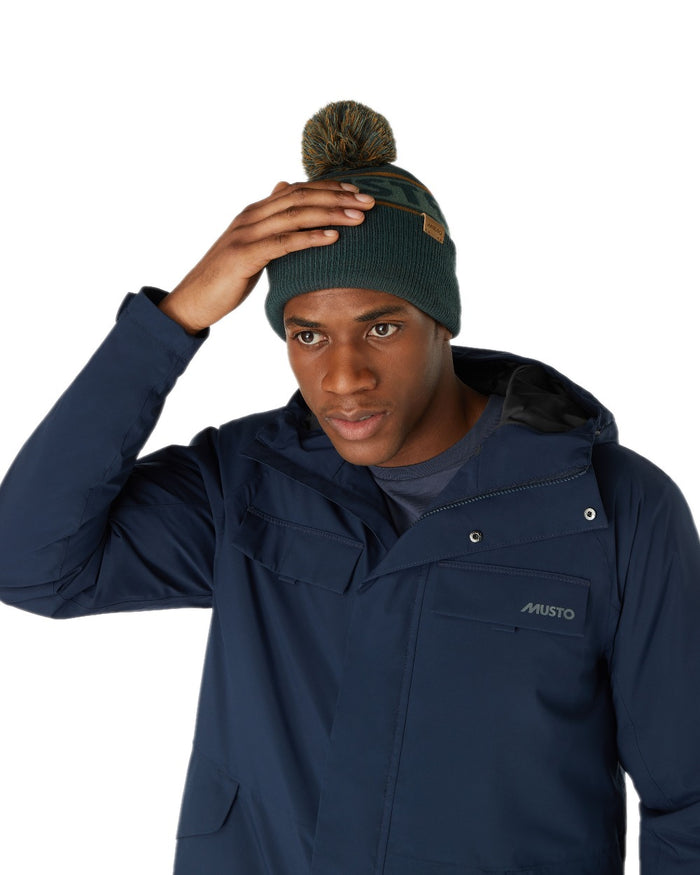 Darkest Spruce Coloured Musto Bobble Hat on white background #colour_darkest-spruce