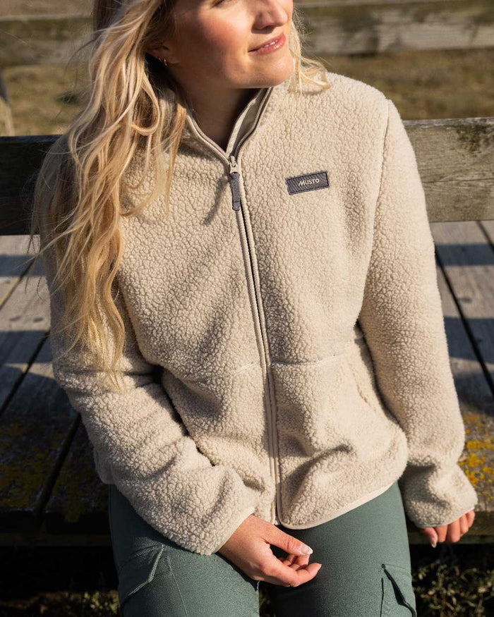 Pure Cashmere Coloured Musto Womens Cover Deep Pile Fleece Jacket on outdoor background #colour_pure-cashmere
