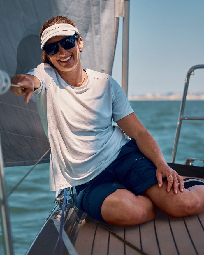 True Navy Coloured Musto Womens Performance Stretch Shorts on Boat Background
#colour_true-navy