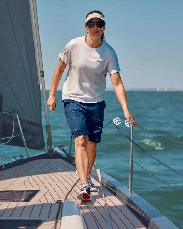 True Navy Coloured Musto Womens Performance Stretch Shorts on Boat Background
#colour_true-navy