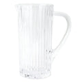 Vietri Natalia Pitcher in clear glass features vertical textured lines, a wide spout, and a large handle, shown against a white background.