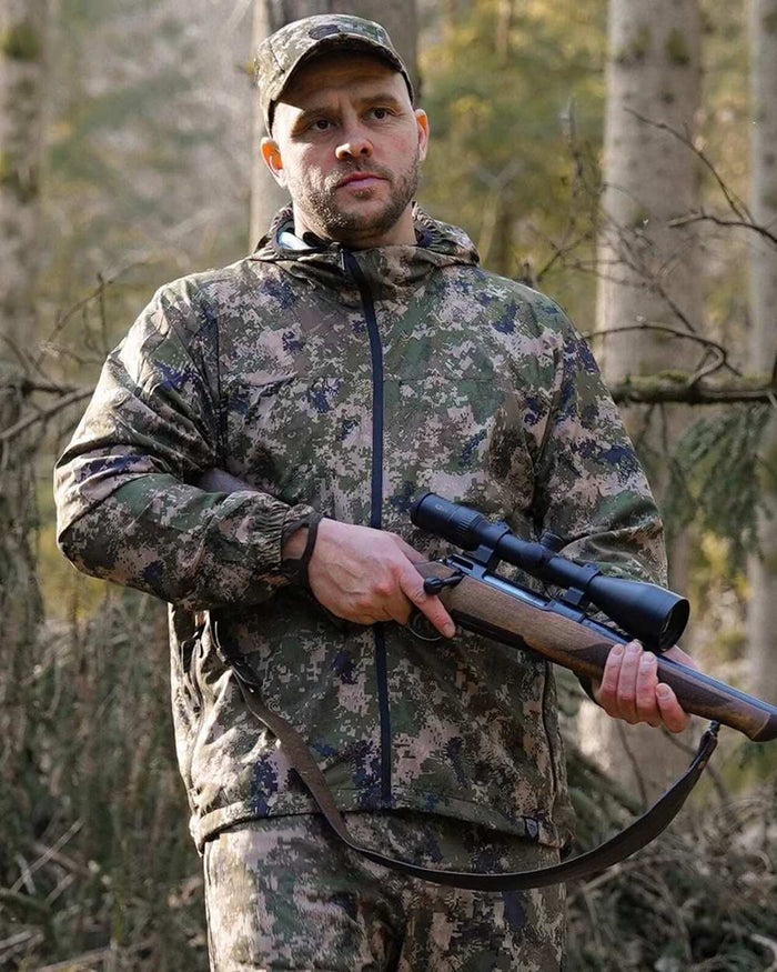 Camo coloured Northern Hunting Kjell Aske Tanatex Hunting Jacket on forest background #colour_camo