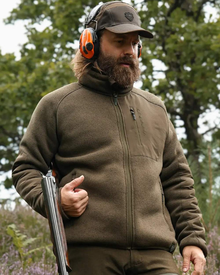 Green coloured Northern Hunting Mens Helge Fleece Jacket on forest background #colour_green