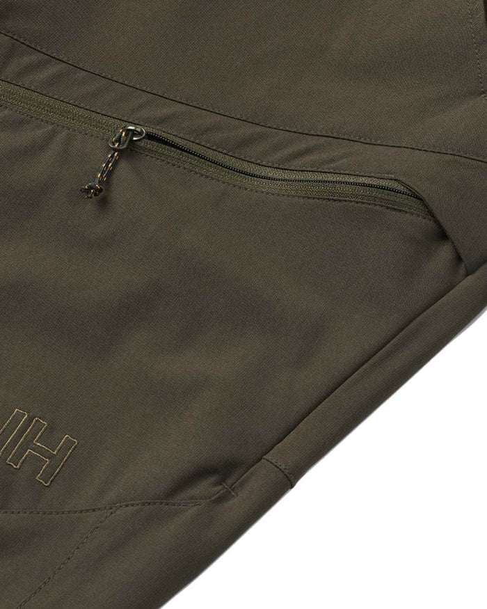 Dark Green coloured Northern Hunting Mens Toke Light Tanatex Outdoor Trousers on white background #colour_dark-green