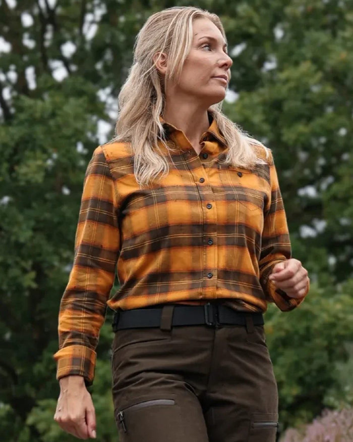 Buckthorn coloured Northern Hunting Womens Astrid Organic Cotton Shirt on forest background #colour_buckthorn