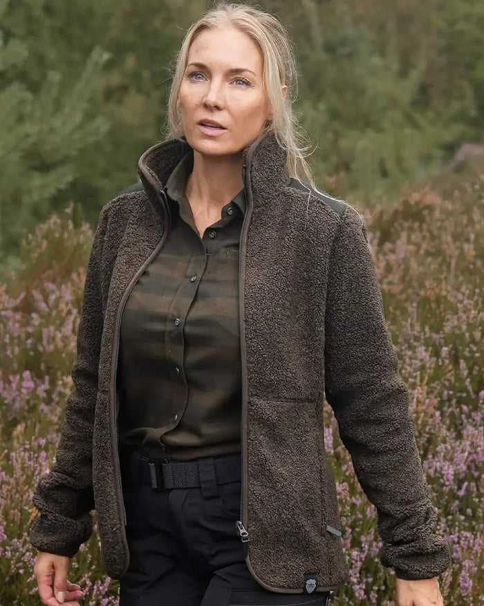 Dark Green coloured Northern Hunting Womens Gudrun Sherpa Fleece on forest background #colour_dark-green