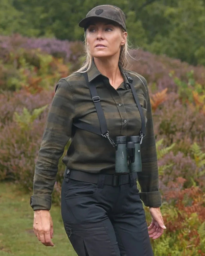 Green coloured Northern Hunting Womens Svala Organic Cotton Shirt on forest background #colour_green