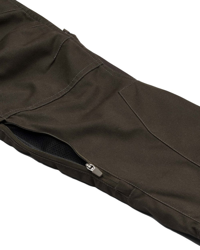 Dark Green coloured Northern Hunting Womens Tyra Pro Outdoor Trousers on white background #colour_dark-green