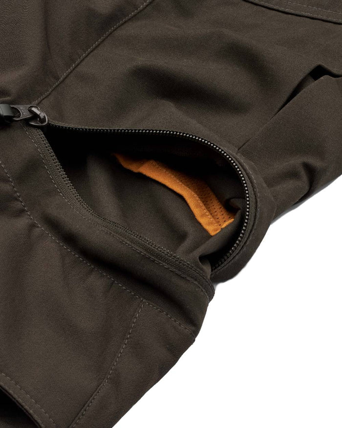 Dark Green coloured Northern Hunting Womens Tyra Pro Outdoor Trousers on white background #colour_dark-green