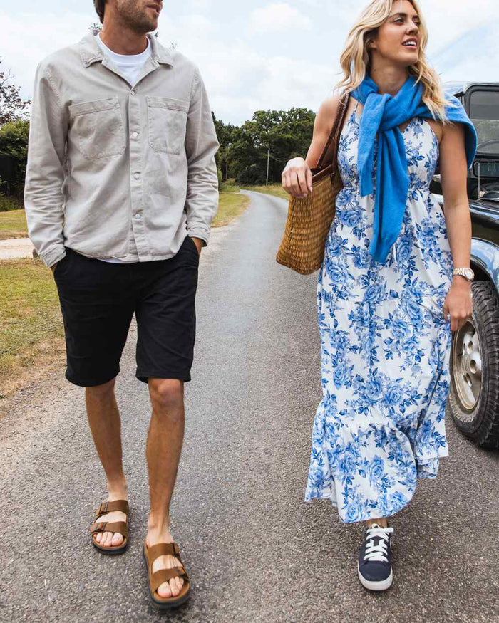 Sand coloured Orca Bay Mens Carbis Sandals on street background #colour_sand