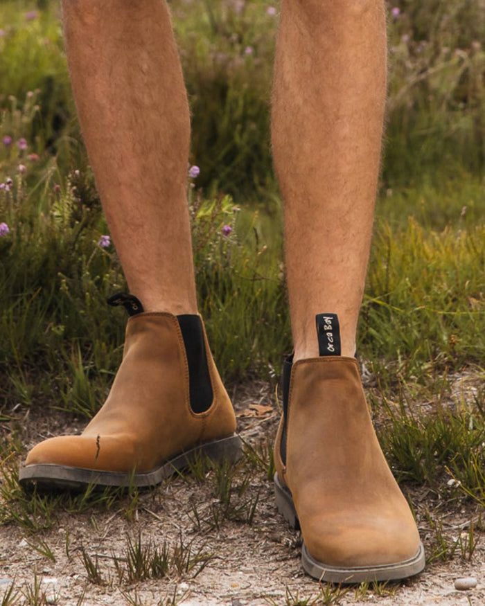 Sand coloured Orca Bay Mens Henley Shoes on grass background #colour_sand