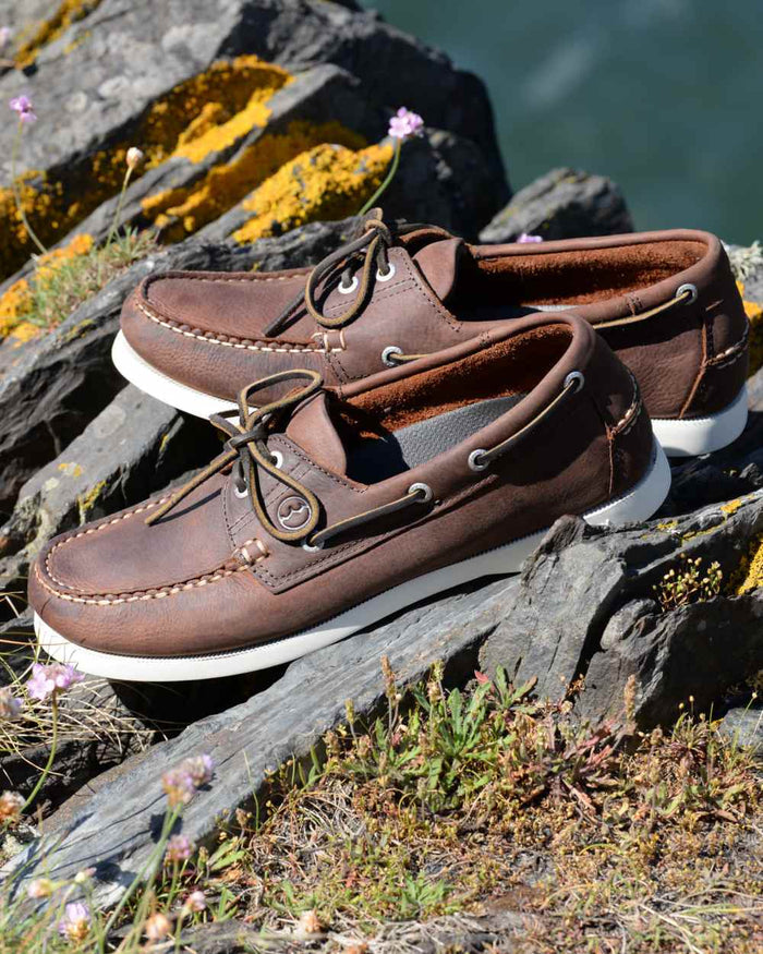 Russet Coloured Orca Bay Mens Maine Deck Shoes on ocean background #colour_russet
