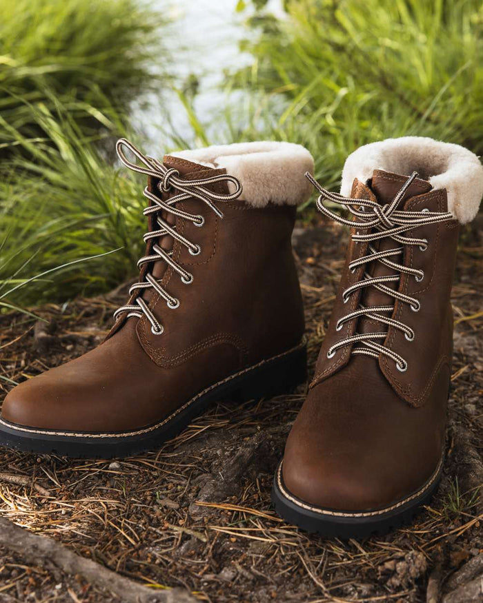 Brown coloured Orca Bay Womens Real Sheepskin Lining Pennine Boots on outdoor background #colour_brown