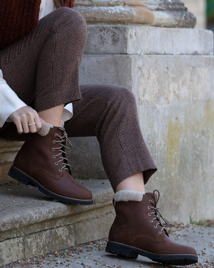 Brown coloured Orca Bay Womens Real Sheepskin Lining Pennine Boots on stairs background #colour_brown
