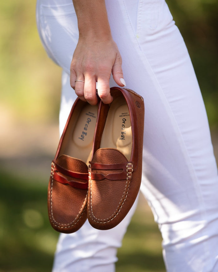 Havana Saddle coloured Orca Bay Womens Richmond Loafers on outdoor background #colour_havana-saddle