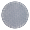 The Bodrum Pearls Round Placemat Set of 4 in light blue features a subtle textured design and a border of small white dots, adding modern charm to any table—perfect for an elegant, embroidered placemat style.