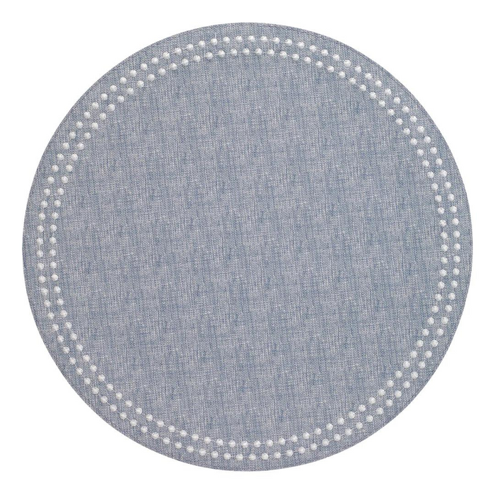 The Bodrum Pearls Round Placemat Set of 4 in light blue features a subtle textured design and a border of small white dots, adding modern charm to any table—perfect for an elegant, embroidered placemat style.