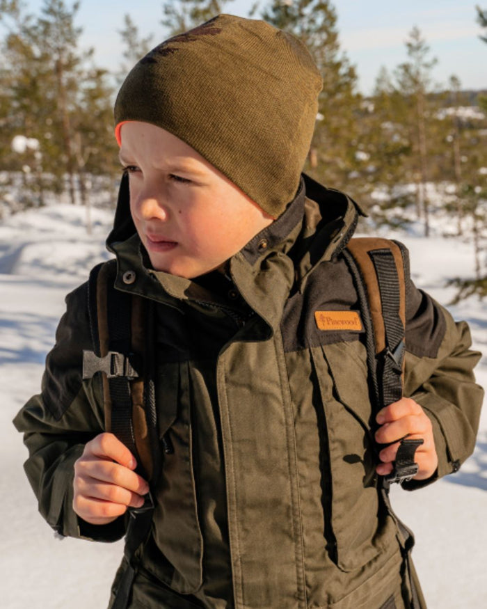 Orange Green coloured Pinewood Childrens Tree Hat on snow background #colour_orange-green