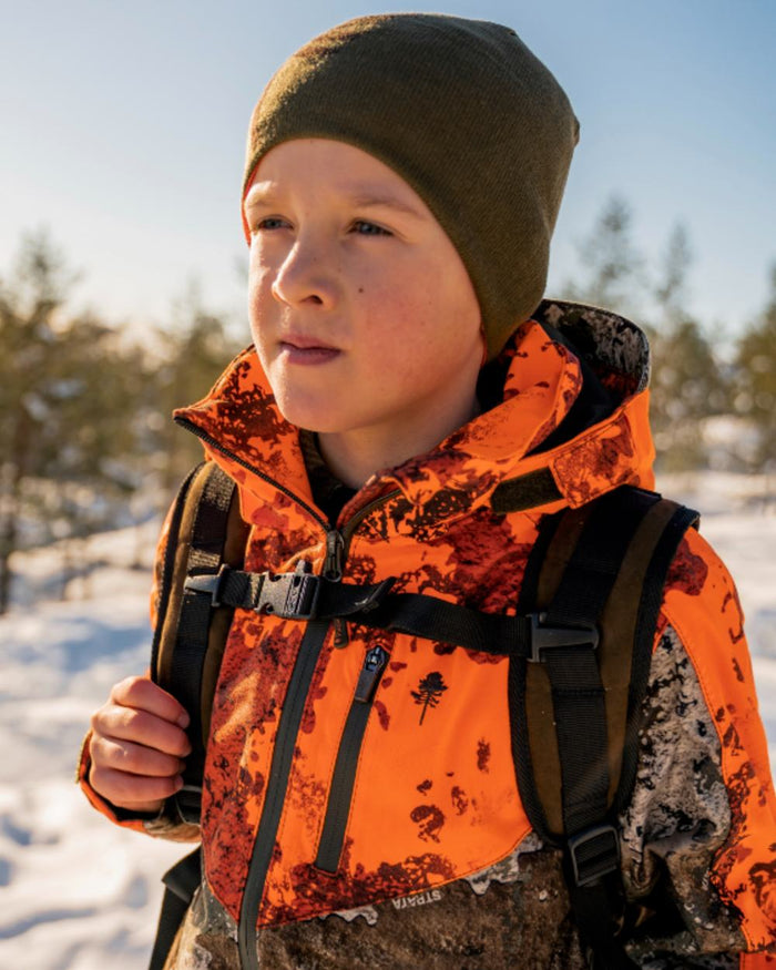 Orange Green coloured Pinewood Childrens Tree Hat on snow background #colour_orange-green