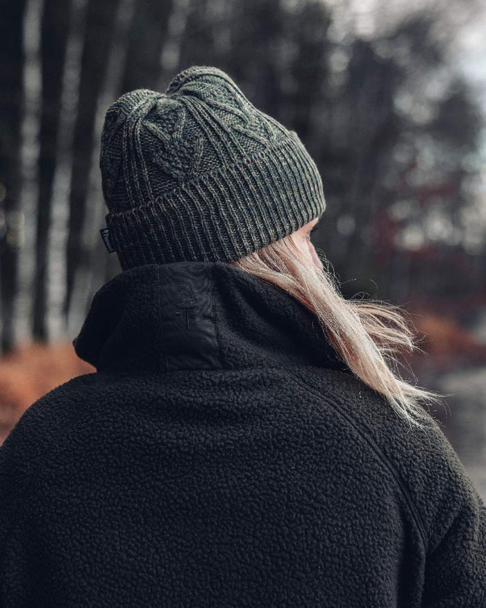 Green Mel Coloured Pinewood Knitted Melange Hat on outdoor background #colour_green-mel