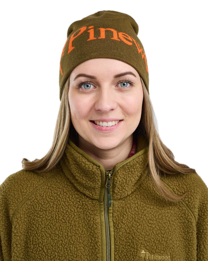 Green Orange Coloured Pinewood Melange Hat on white background #colour_green-orange