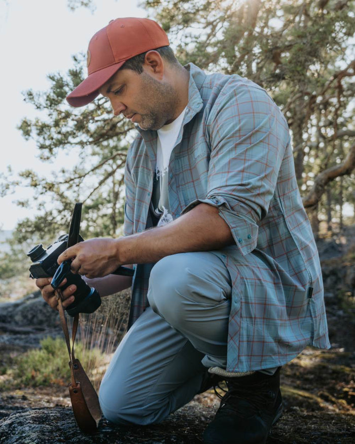 Aqua Grey coloured Pinewood Mens Abisko Trekking InsectSafe Long Sleeve Shirt on forest background #colour_aqua-grey