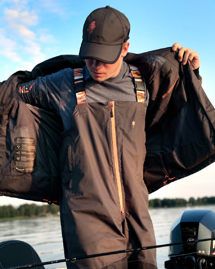 Dark Anthracite Black Coloured Pinewood Mens Bolmen Fishing Jacket on outdoor background #colour_dark-anthracite-black
