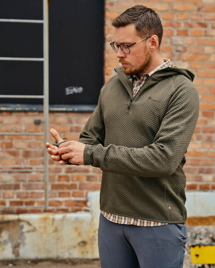 Dark Green Mel Coloured Pinewood Mens Everyday Travel Hoodie on outdoor background #colour_dark-green-mel
