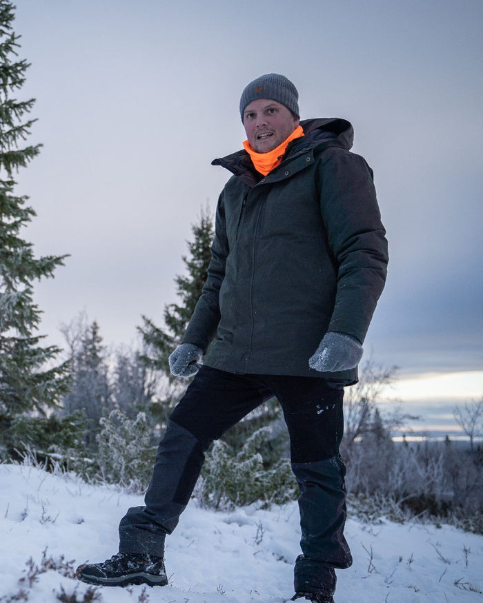 Black Dark Anthracite Coloured Pinewood Mens Finnveden Hybrid Extreme Trousers on snow background #colour_black-dark-anthracite