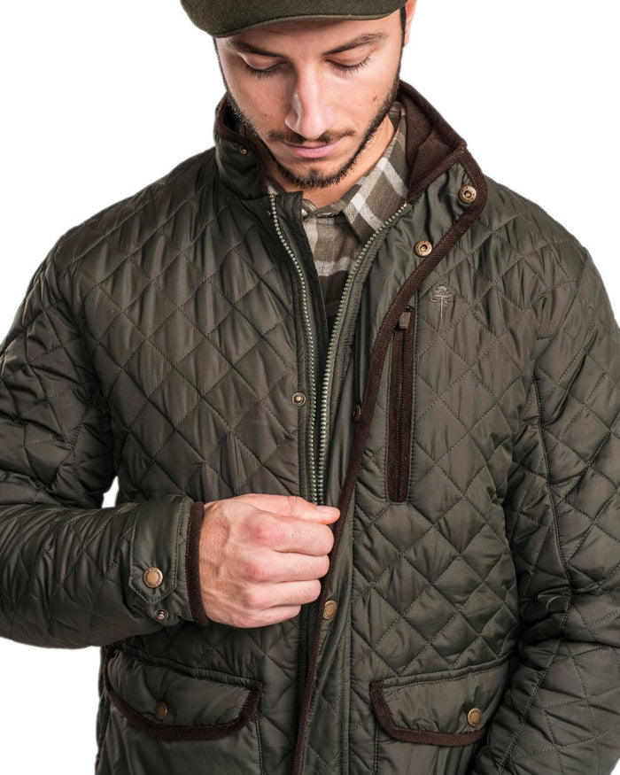 Moss Green Coloured Pinewood Mens Nydala Classic Quilted Jacket on white background #colour_moss-green