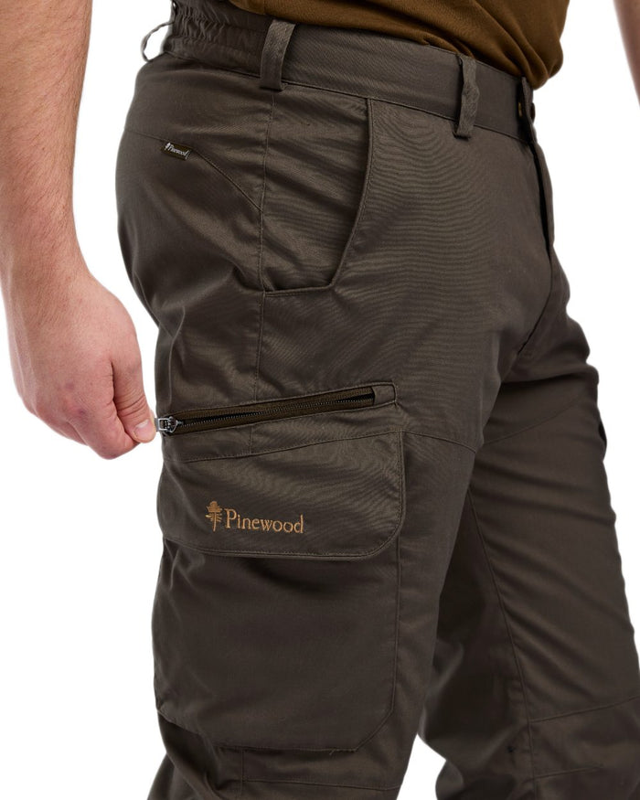 Dark Olive coloured Pinewood Mens Smaland Hunters Insectsafe Trousers on white background #colour_dark-olive