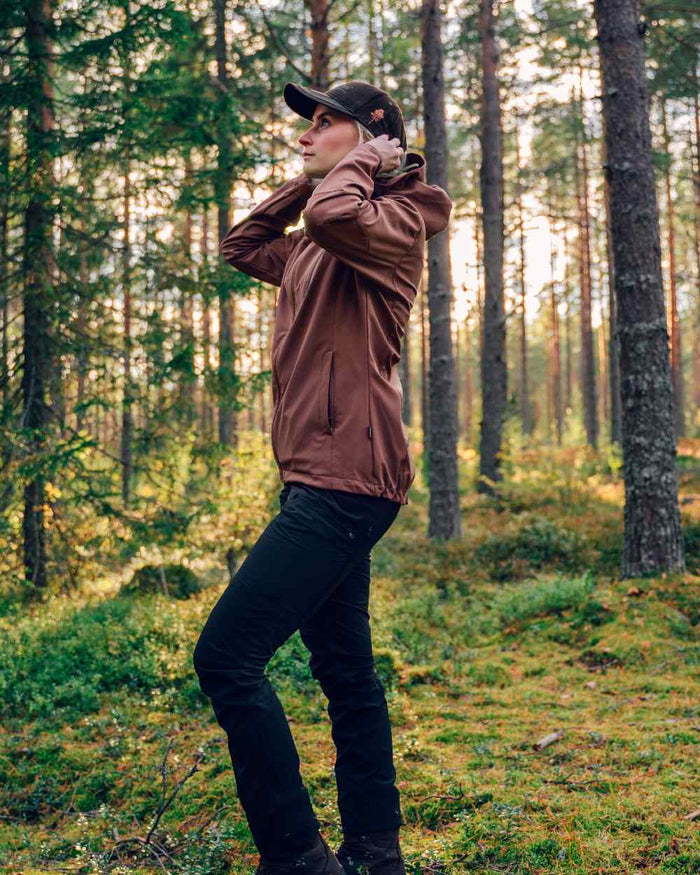 Black Coloured Pinewood Womens Abisko Brenton Trousers on outdoor background #colour_black