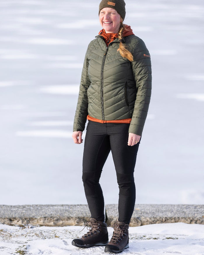 Black Coloured Pinewood Womens Finnveden Active Tights on outdoor background #colour_black