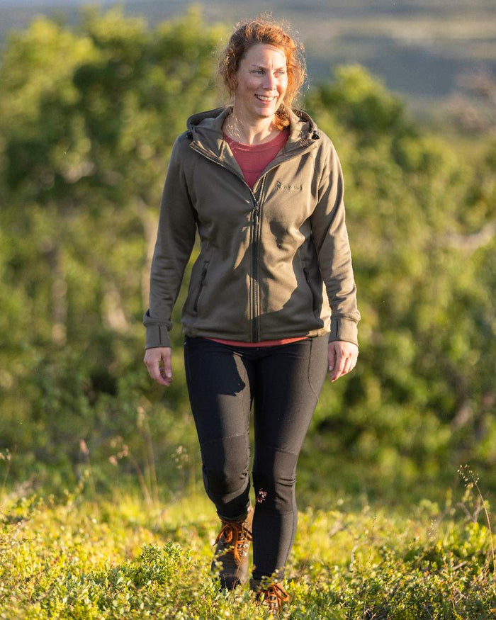 Black Coloured Pinewood Womens Finnveden Active Tights on outdoor background #colour_black