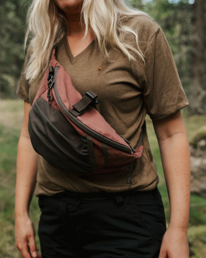 Olive Green coloured Pinewood Womens Finnveden Forest T-Shirt on forest background #colour_olive-green