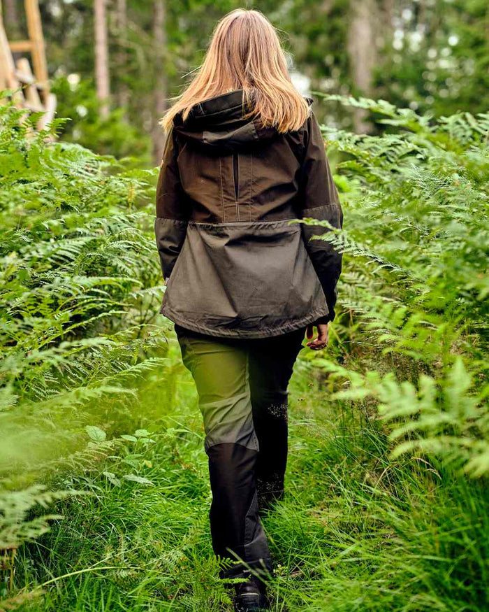 Mossgreen Dark Mossgreen Pinewood Womens Furudal Tracking Trousers on forest background #colour_mossgreen-dark-mossgreen