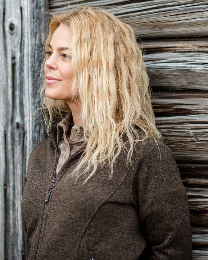 Olive Melange coloured Pinewood Womens Gabriella Fleece Jacket on outdoor background #colour_olive-melange