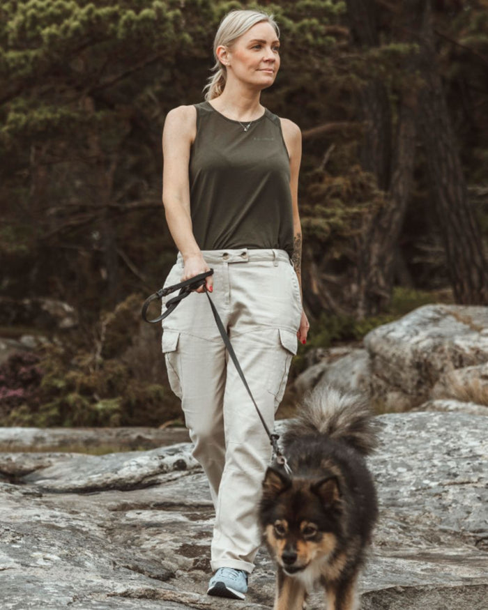 Linen Beige coloured Pinewood Womens Varnamo Insectsafe Linen Trousers on forest background #colour_linen-beige