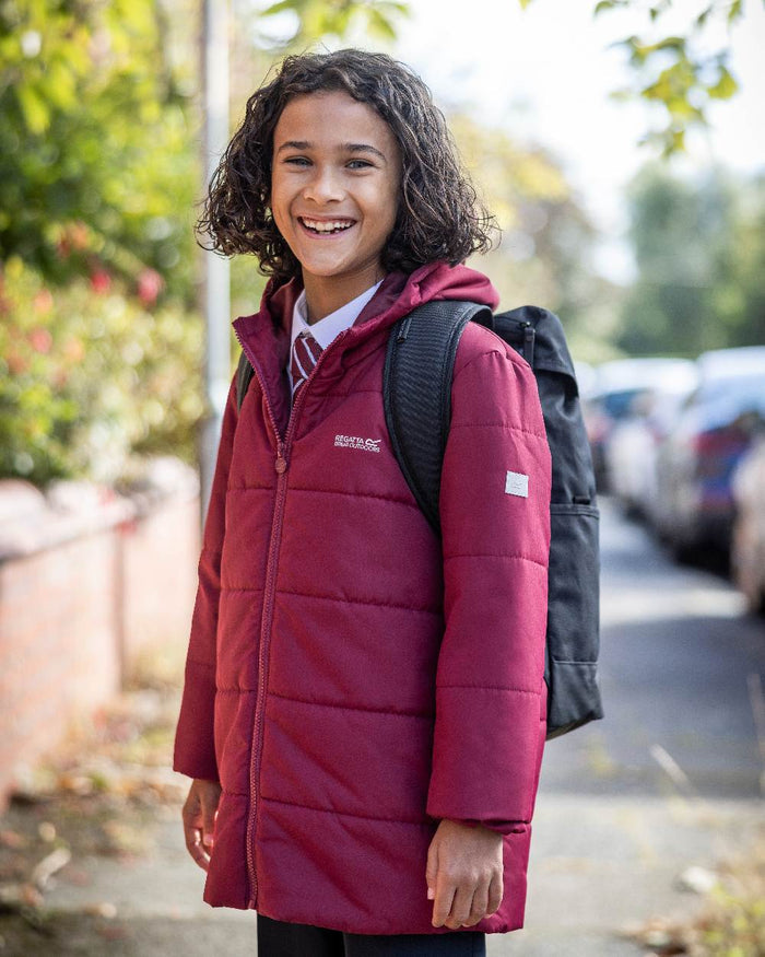 Dark Pimento Coloured Regatta Childrens Halkner Quilted Jacket on outdoor background #colour_dark-pimento